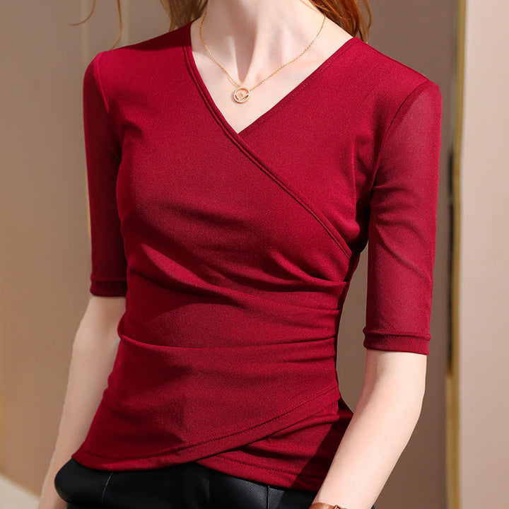 Feminine elegant women's half sleeve wrap top. Stylish V-neck & draped design, perfect for any occasion.