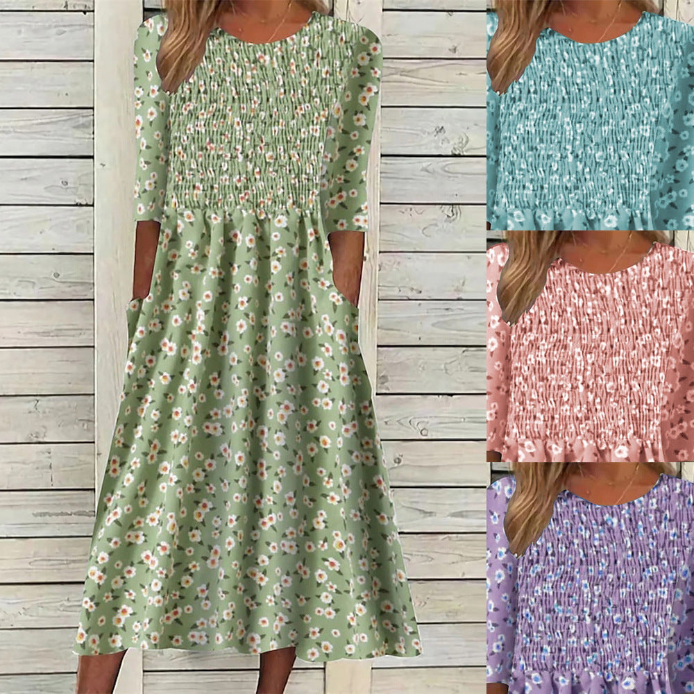 Women's chic floral smocked midi dress, perfect for summer. Features pockets & elegant spring style.