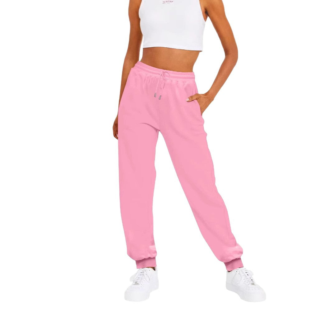 Versatile women's casual bottoms; soft joggers with an elastic waist and convenient pockets for daily wear.