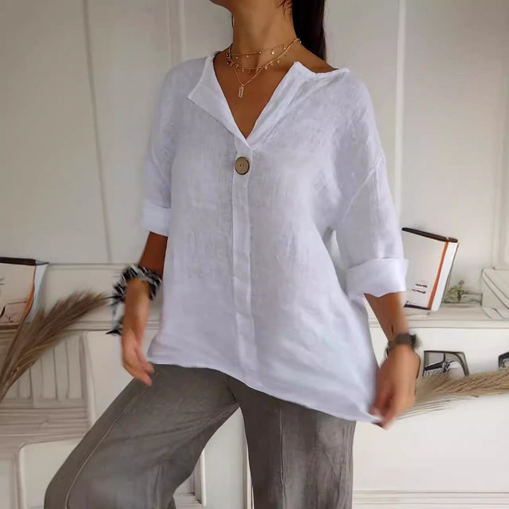 Stylish women's button-front blouse for easygoing casual outfits. Comfortable & flowy summer top.