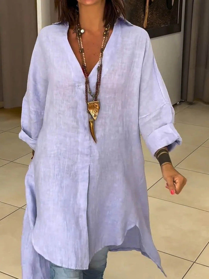 Classic women's casual blouse, a must-have button-down top with practical roll-up sleeves.
