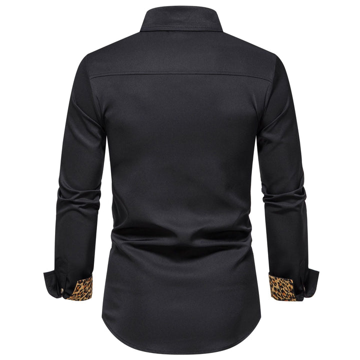 Close-up of leopard trim collar & cuff on a sophisticated men's white long-sleeve button-up shirt.
