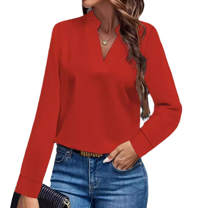 Stylish women's long sleeve blouse with stand-up collar, perfect for an elegant office or casual chic outfit.