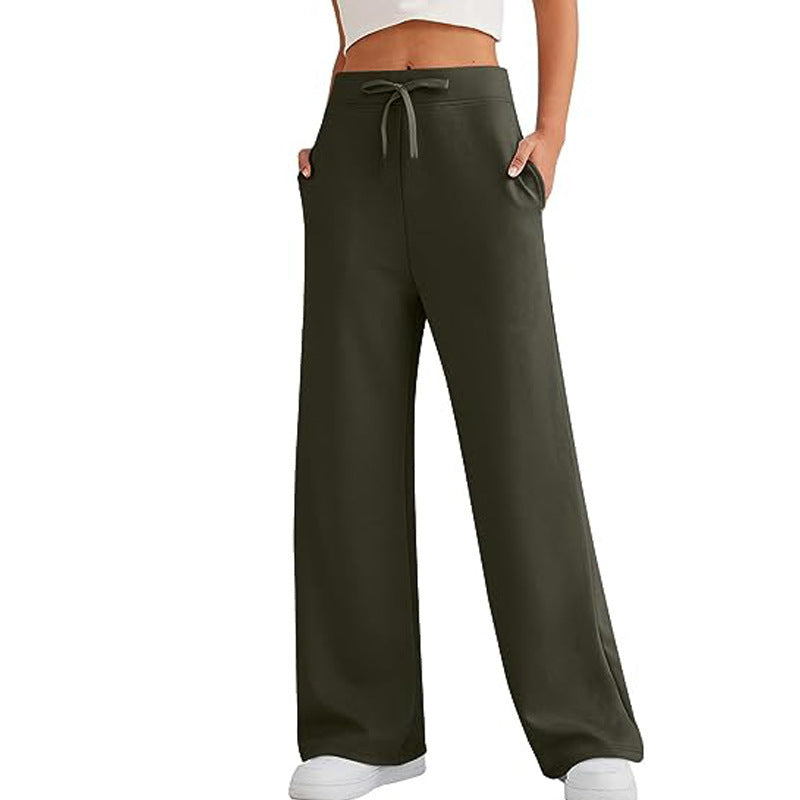 Stylish women's loose fit lounge pants, perfect for athleisure & everyday comfort, featuring practical pockets.