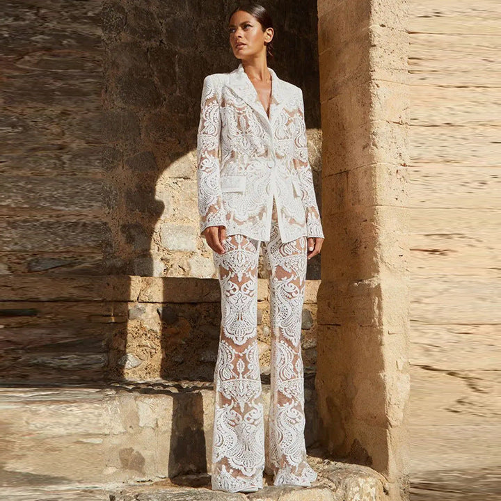 Fashionable black women's outfit set featuring a sharp blazer and trendy flared trousers for an elegant look.