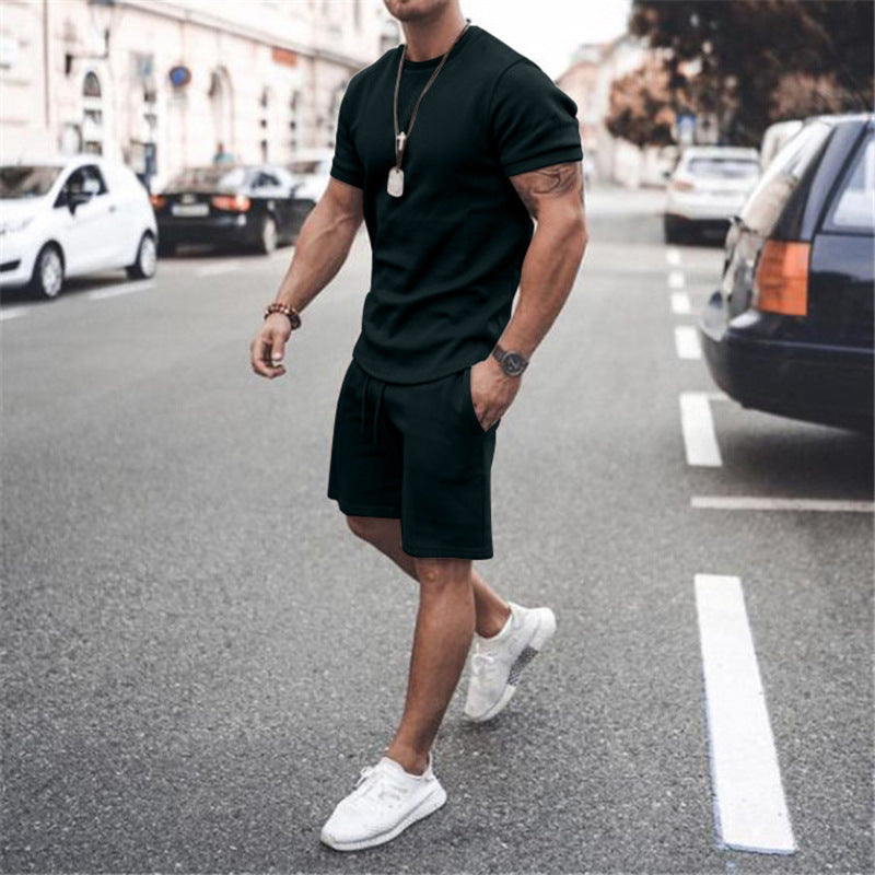 Stylish men's sportswear combo: lightweight t-shirt and athletic shorts.
