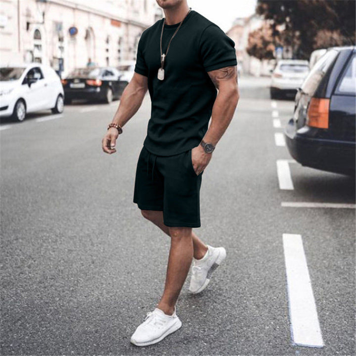 Stylish men's sportswear combo: lightweight t-shirt and athletic shorts.