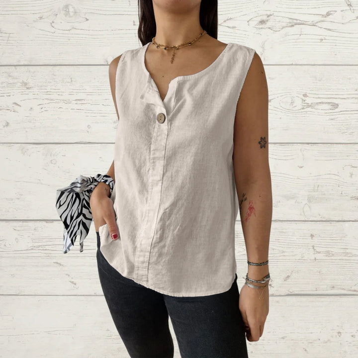 Comfortable lightweight sleeveless blouse for women. Round neck & subtle button details, ideal for summer.
