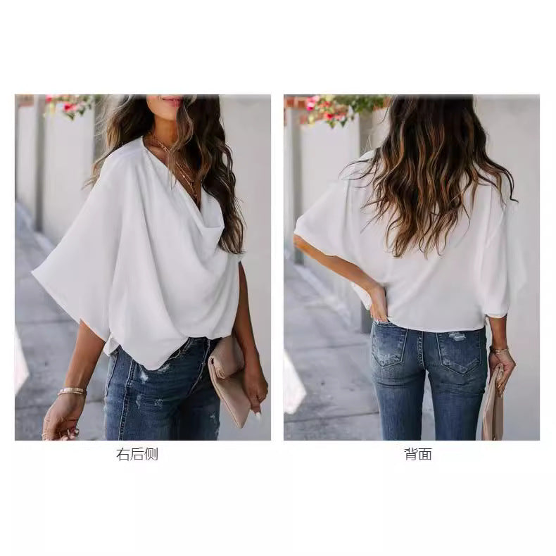 Sophisticated women's V-neck blouse featuring elegant draping & loose-fitting sleeves, ideal for chic style.