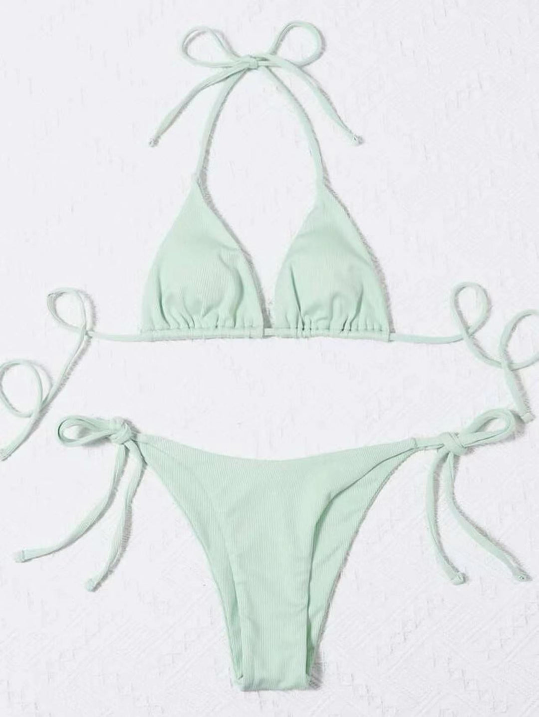 Ribbed striped tie-front bikini set with adjustable fit. Great flattering women's beachwear.