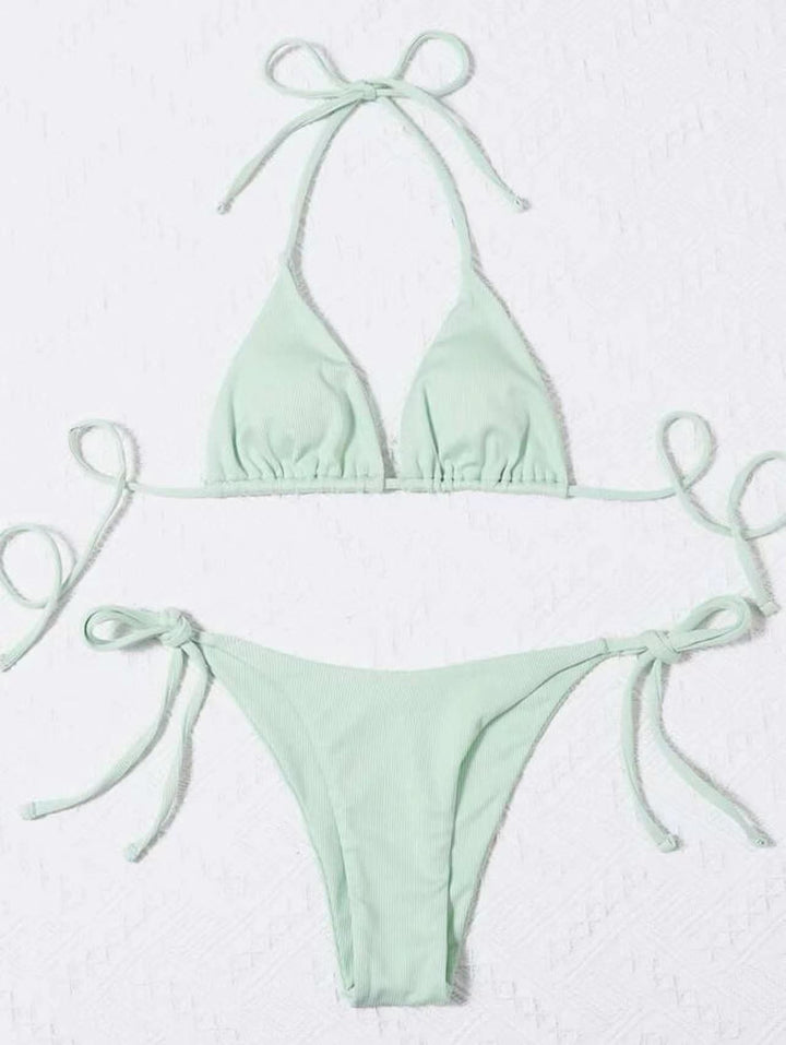 Ribbed striped tie-front bikini set with adjustable fit. Great flattering women's beachwear.