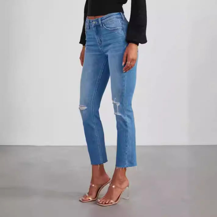 Trendy ladies' modern fit cropped jeans, high-waisted, perfect for a chic summer outfit.