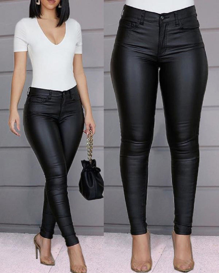 Woman wearing comfortable, sleek high waist leggings; perfect figure-hugging fit for active style.