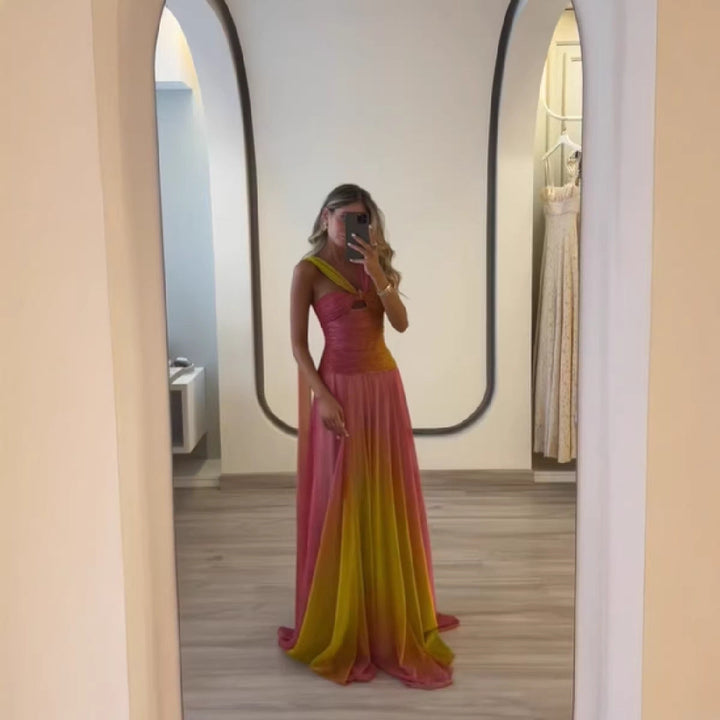 Feminine flowing maxi dress for women, ideal as a summer party dress or a chic wedding guest outfit.