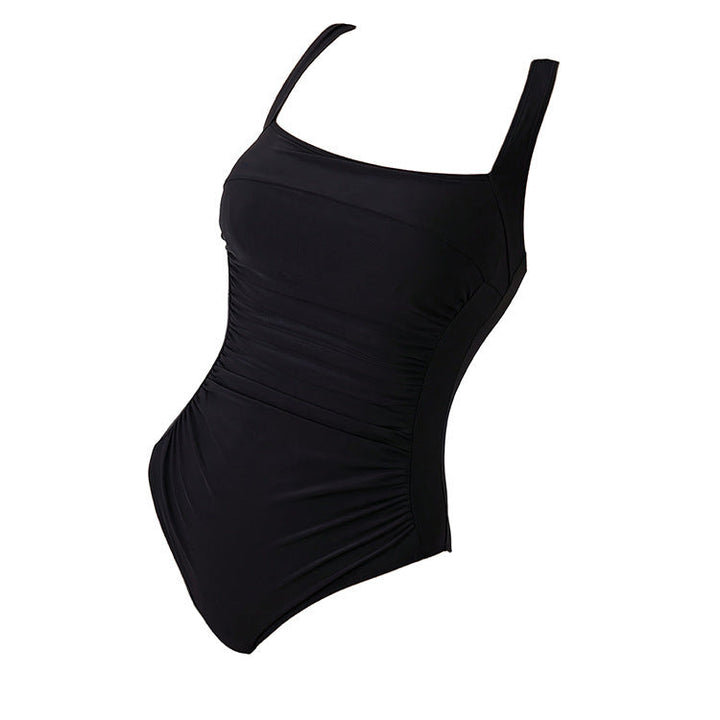 Woman modeling an elegant black square neck monokini swimsuit, perfect for summer poolside and beach holidays.