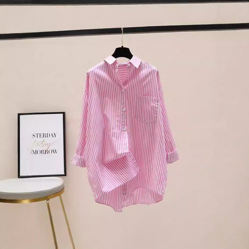 Stylish women's oversized striped long-sleeve shirt with chest pocket, versatile for everyday fashion.