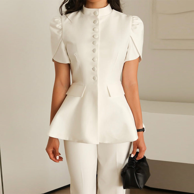 Chic white blazer for women, featuring voluminous sleeves & tailored fit. Versatile fashion for stylish outfits.