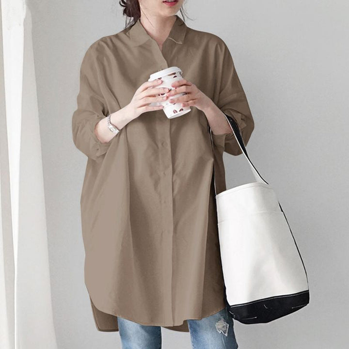 Elegant oversized long sleeve women's tunic, a versatile plus size button-up top.