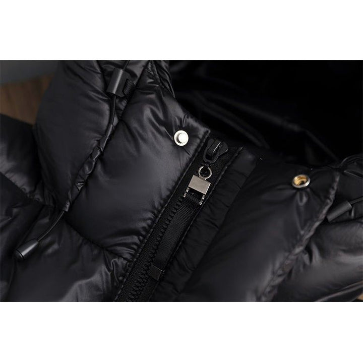 Cozy women's hooded winter jacket, a stylish quilted longline design.