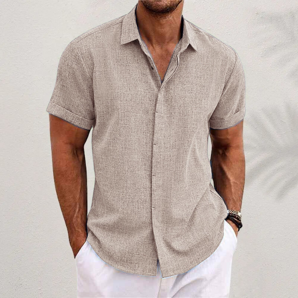 Stylish men's linen short sleeve button-up shirt, versatile for beach, resort, or casual summer wear.