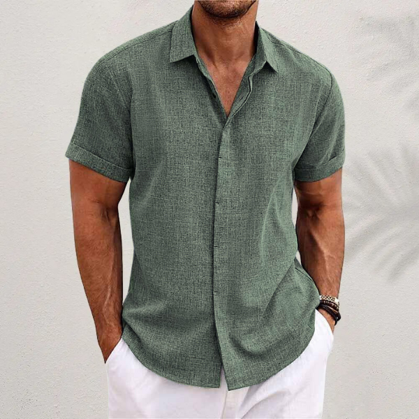 Men's classic collared button-down shirt for warm weather, featuring a relaxed fit & short sleeves.
