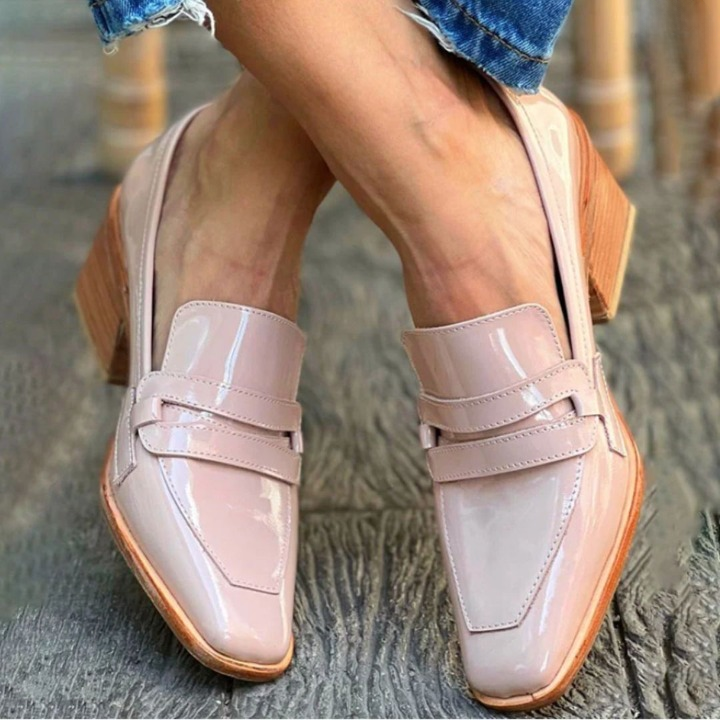 Elegant women's pink patent loafers with a chunky heel and square toe. Perfect versatile fashion footwear.