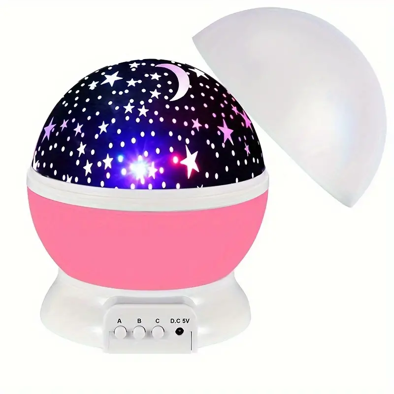 Rotating star projector night light for children's room. Soothing LED celestial display, perfect nursery decor.
