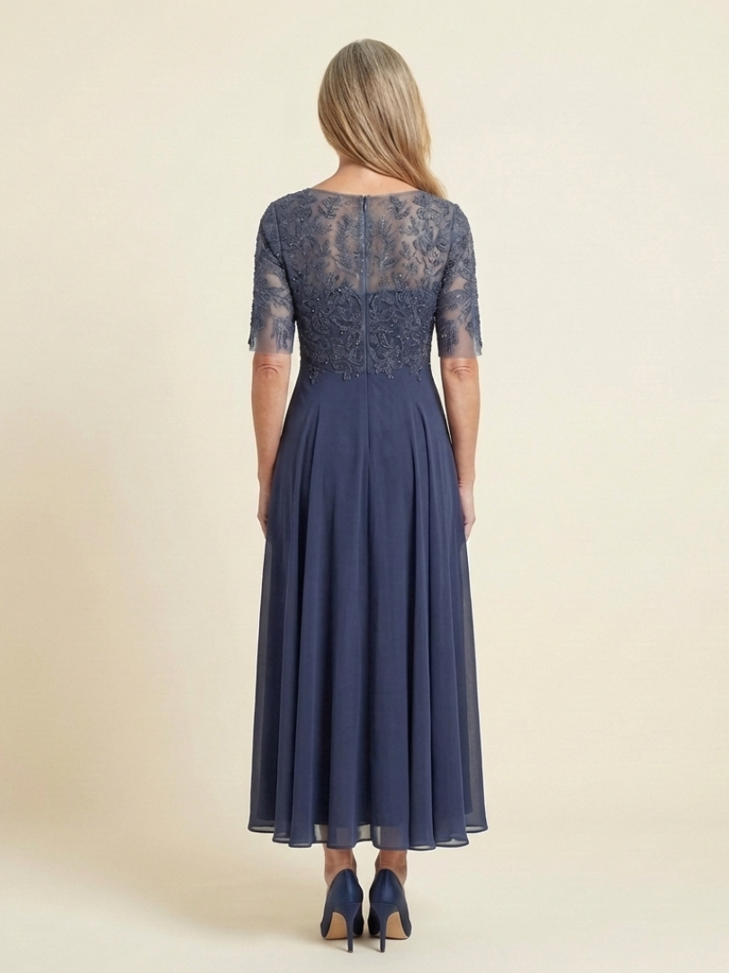 Stylish women's lace midi dress, featuring three-quarter sleeves and a tailored fit for special occasions.