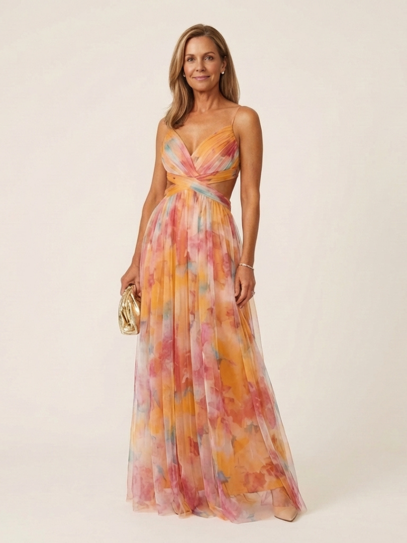 Women's elegant sleeveless V neck pleated maxi dress in a flowing fabric, perfect for summer occasions.