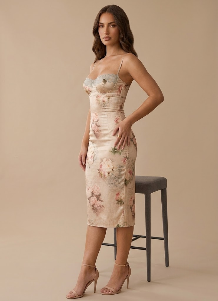 Women's elegant strapless green floral corset midi dress. Structured formal wear for wedding guests.