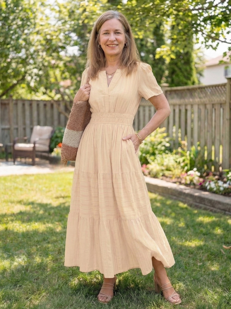 Stylish women's short sleeve tiered maxi dress, a flowing and comfortable choice for summer casual fashion.