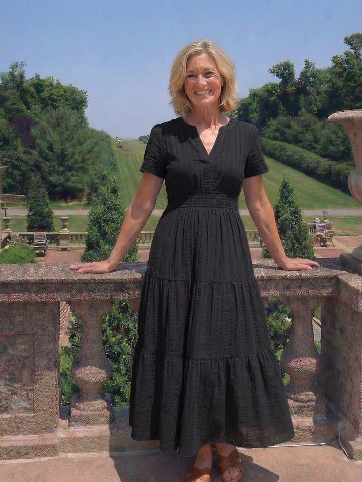 Versatile women's maxi dress: short sleeves, tiered skirt, smocked waist. Great for casual spring & summer comfort.