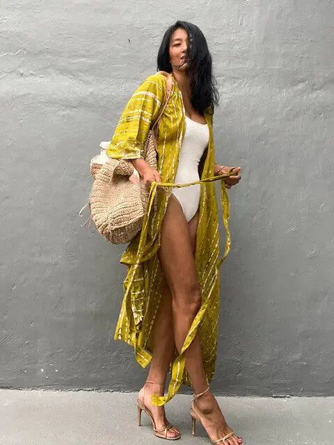 Flowy beach sarong cover-up in vibrant boho summer style for women.