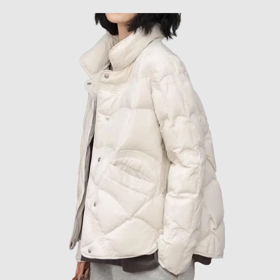 Women's white quilted winter coat, a trendy & warm jacket for cold weather and stylish casual wear.