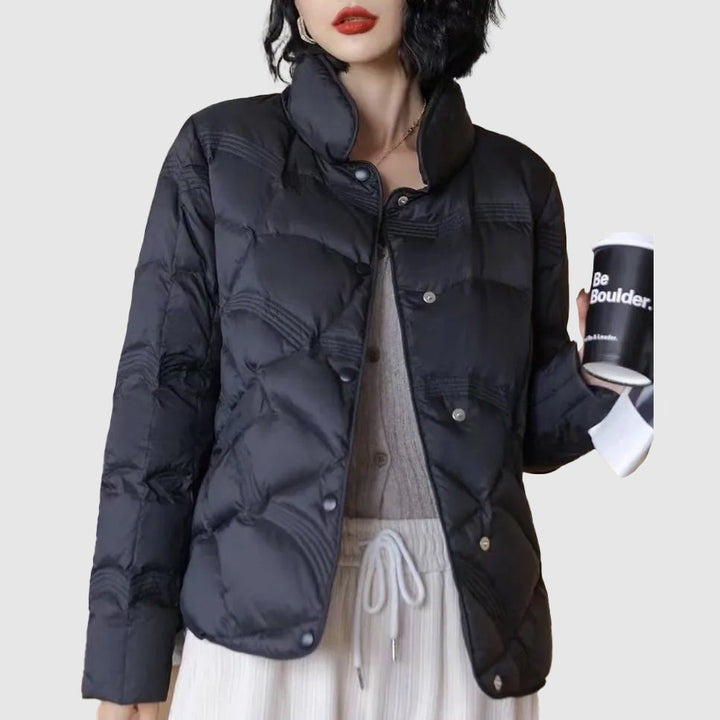Trendy brown quilted women's outerwear jacket, warm & stylish for winter, perfect for cold weather.