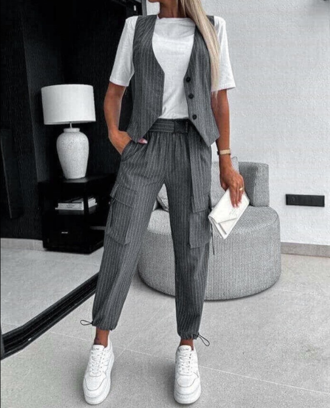 Modern striped women's suit set featuring a stylish vest, versatile top, and comfortable pants ensemble.