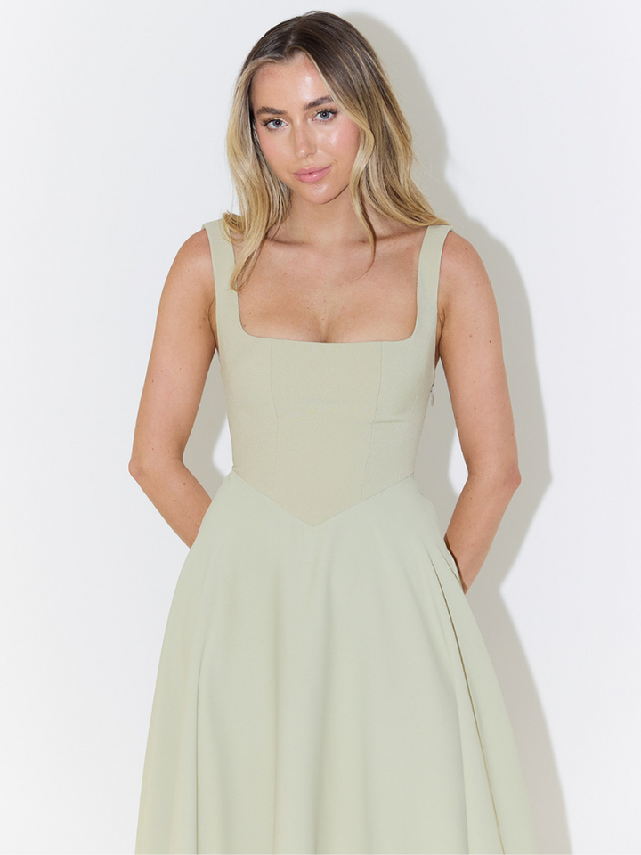 Fashionable women's midi dress, ideal for summer events, occasion wear & chic style.