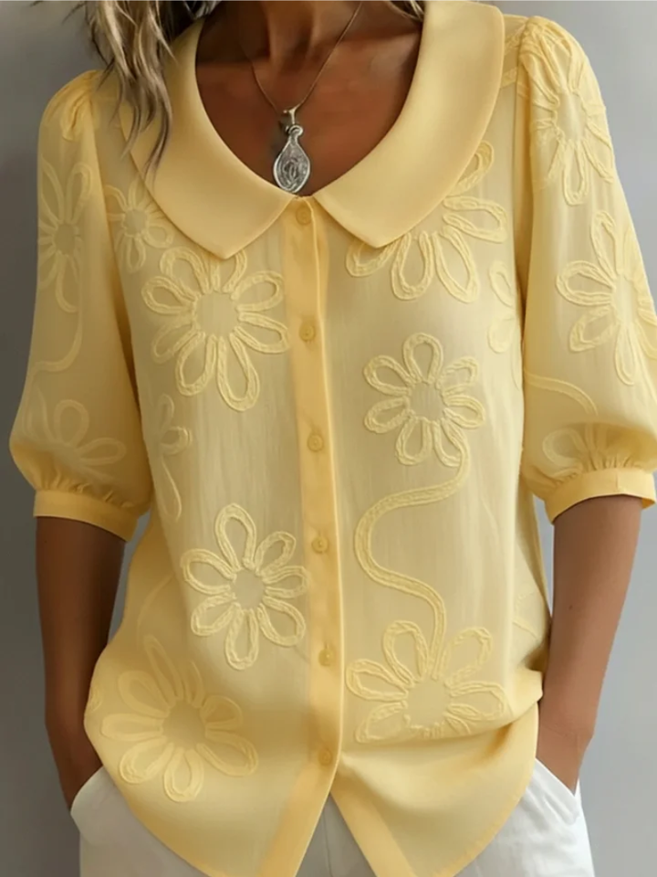 Women's stylish floral embroidered short sleeve blouse with round neck for everyday elegance.