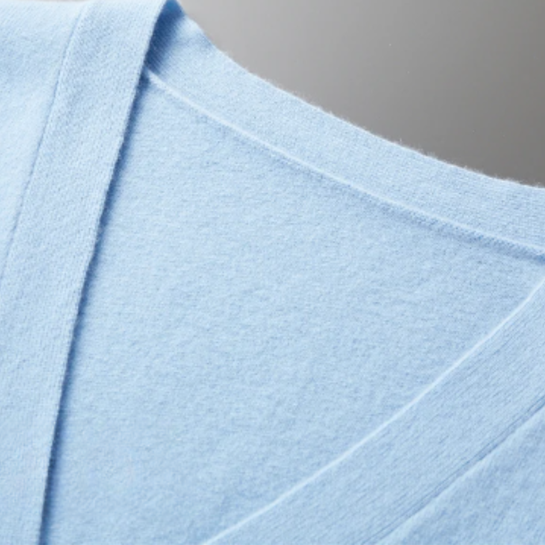 Men's classic V-neck cardigan sweater for effortless layered style. Perfect for chilly weather.