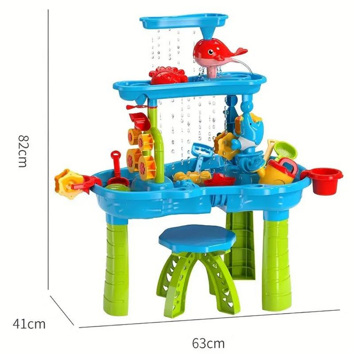 Toddler delighting in the Splash Fun Water Table, an engaging outdoor activity for sensory and motor skill development.