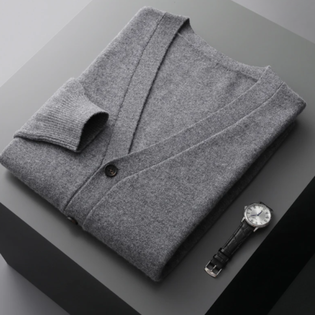 Soft knit men's V-neck cardigan sweater. Essential for layering in fall & winter fashion.