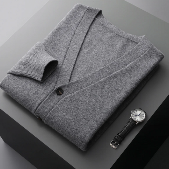 Soft knit men's V-neck cardigan sweater. Essential for layering in fall & winter fashion.