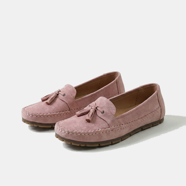 Classic black women's tassel loafers. Elegant slip-on comfort for work or casual wear.