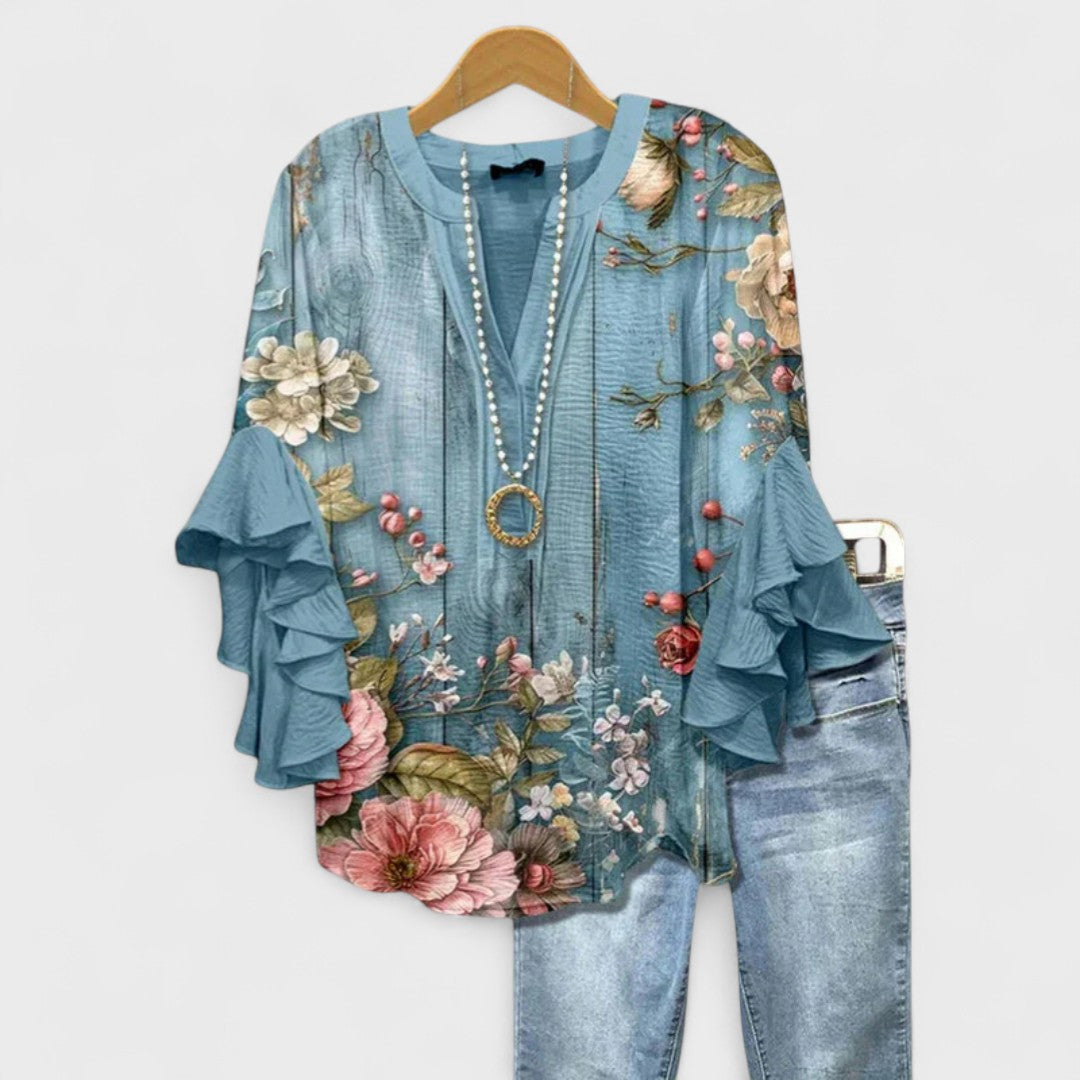 Women's elegant V-neck blouse, chic ruffle sleeves, perfect for a refined summer look.