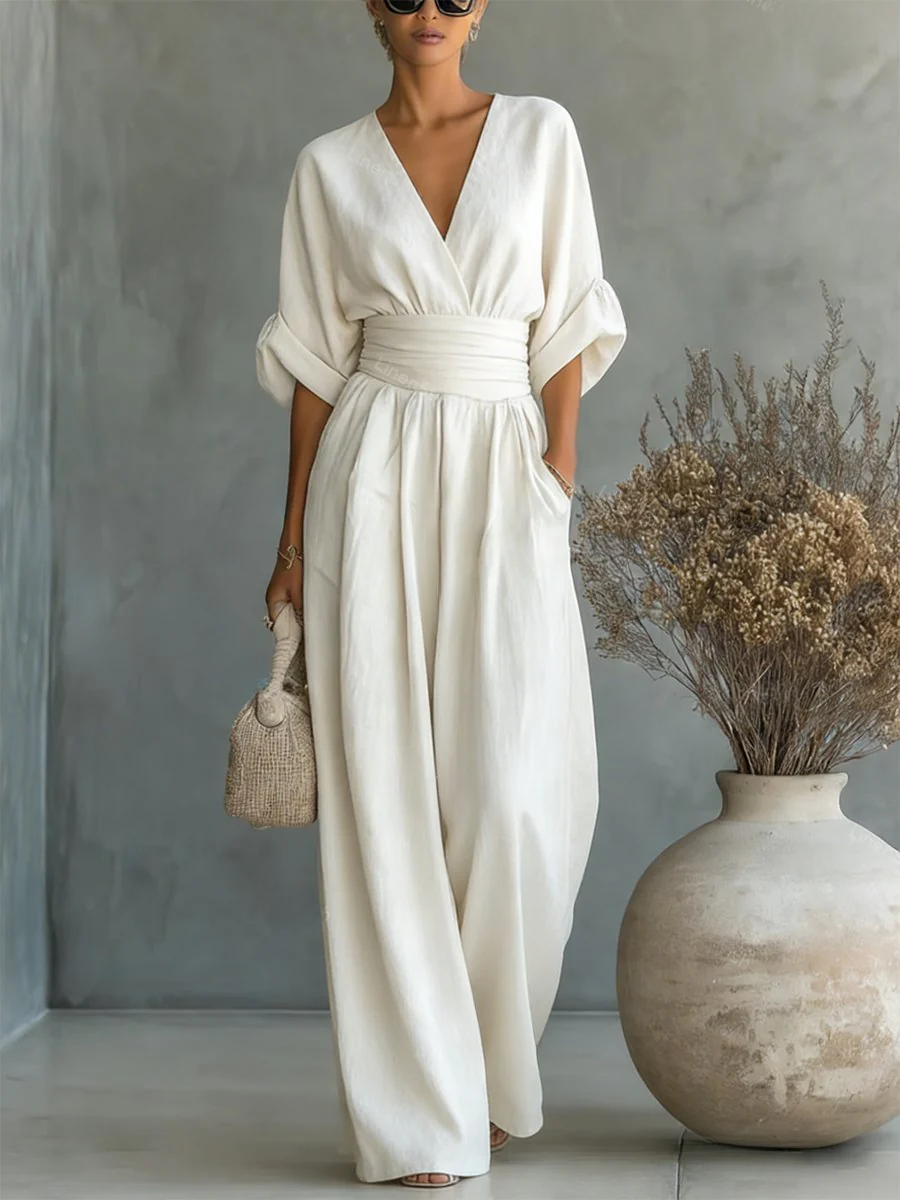 Stylish one-piece women's V-neck jumpsuit with a tailored fit, versatile for day-to-night wear.