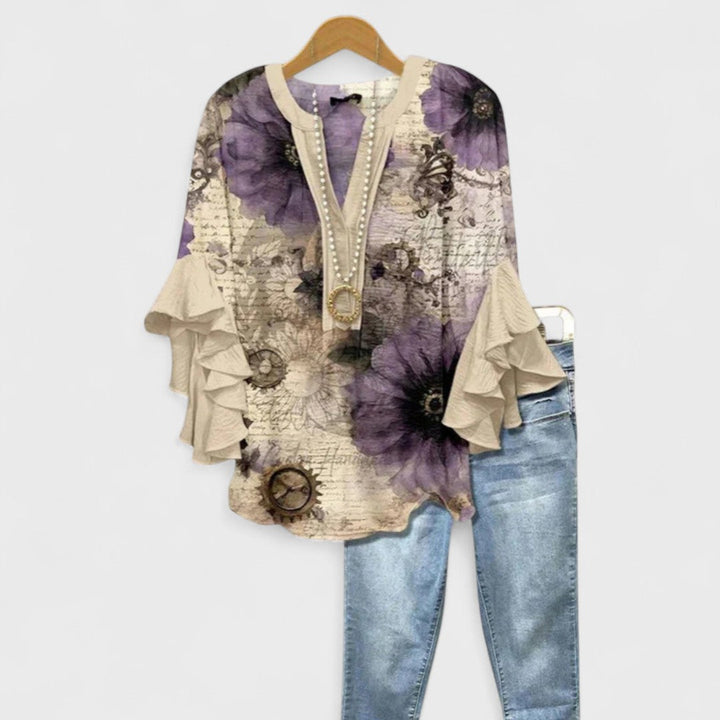 Stylish V-neck blouse for women with elegant ruffle short sleeves, a must-have summer fashion item.