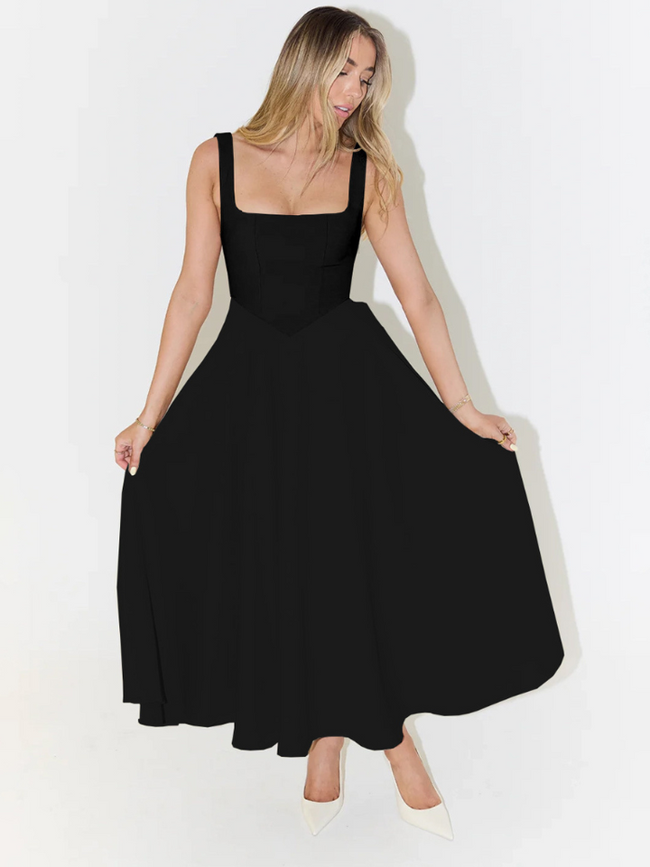 Flowy elegant midi dress, soft fabric for women's comfort & stylish relaxed fit.
