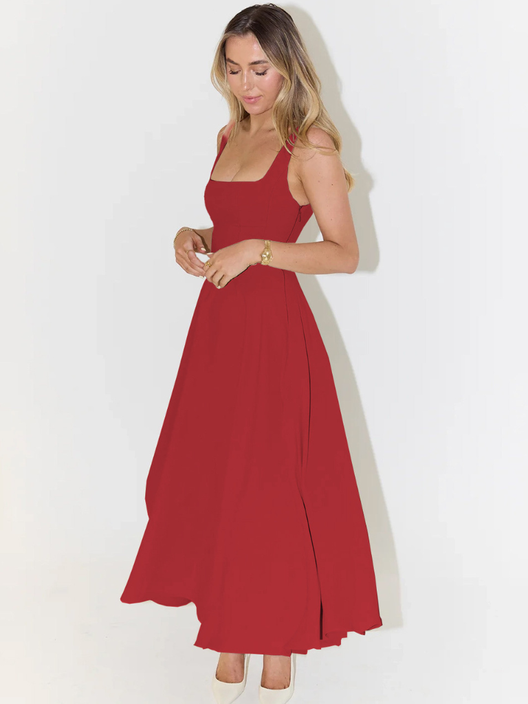 Outdoor shot of chic women's midi dress, perfect for relaxed summer style & comfort.