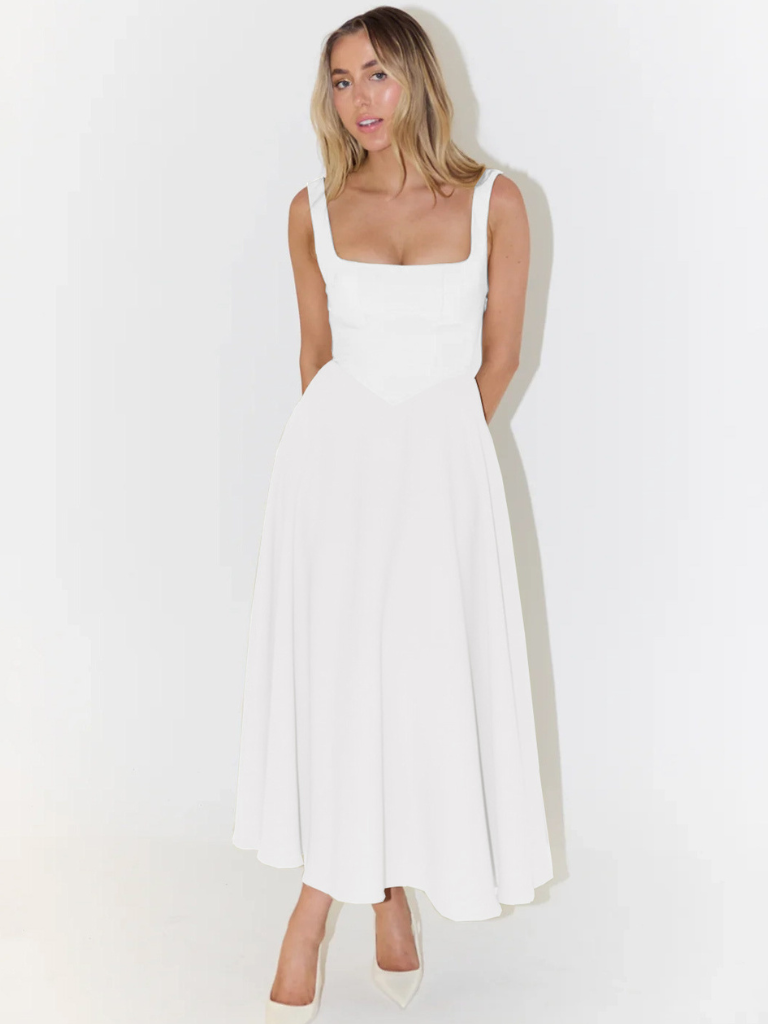 Flat lay of chic women's midi dress, perfect for versatile summer fashion & comfort.