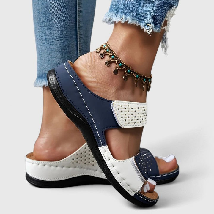 Ergonomic women's sandals provide orthopaedic comfort & arch support for active wear.
